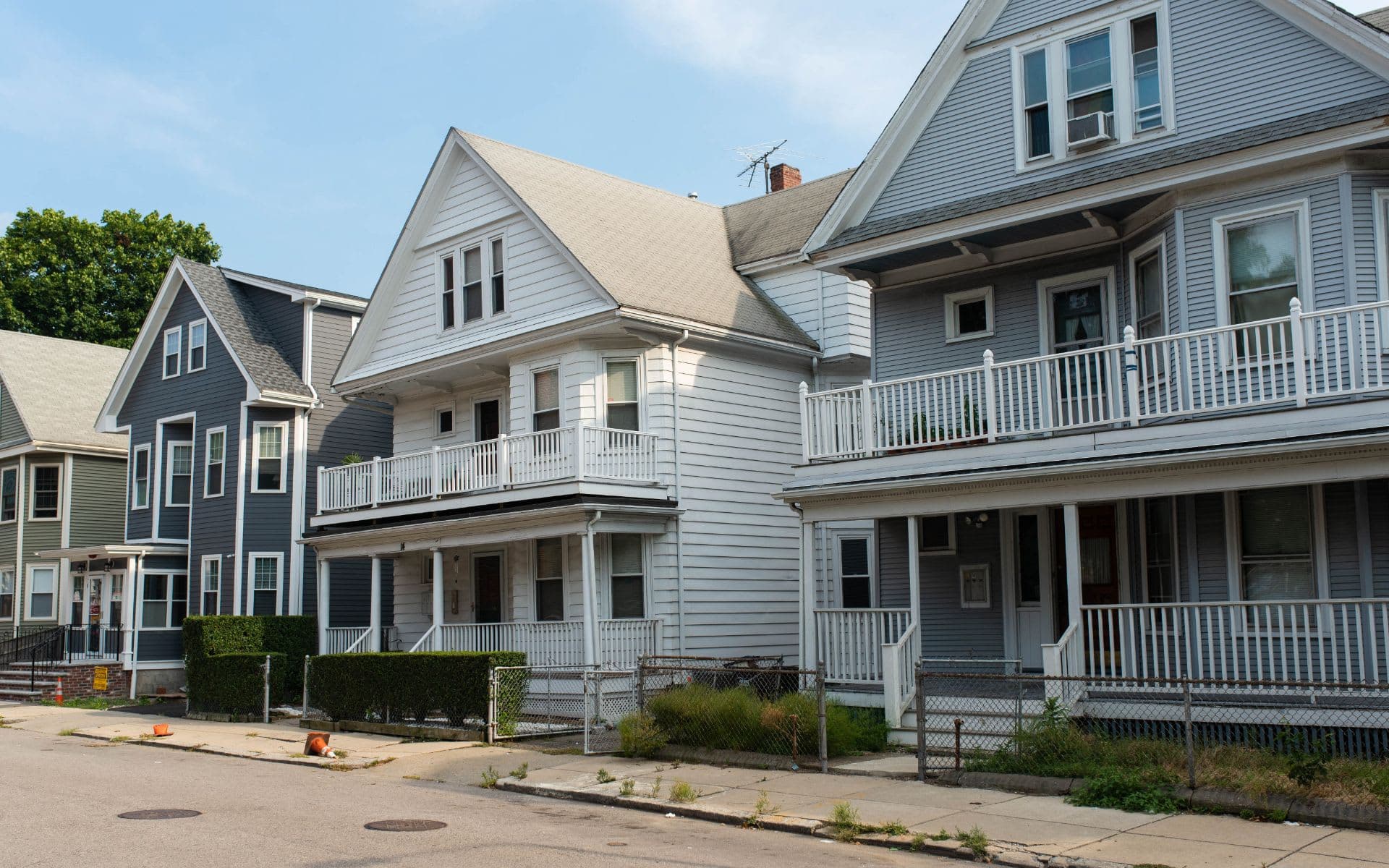 Two- and three-family houses on a Boston street